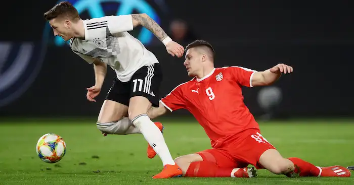Marco Reus of Germany and Luka Jovic of Serbia