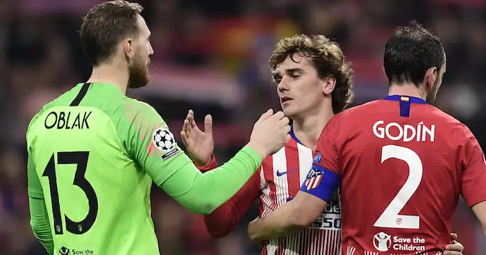 Atletico Madrid's French forward Antoine Griezmann (C) celebrates his team's win with Atletico Madrid's Uruguayan defender Diego Godin (R) and Atletico Madrid's Slovenian goalkeeper Jan Oblak at the end of the UEFA Champions League round of 16 first leg football match between Club Atletico de Madrid and Juventus FC at the Wanda Metropolitan stadium in Madrid on February 20, 2019. (Photo by JAVIER SORIANO / AFP) (Photo credit should read JAVIER SORIANO/AFP/Getty Images)