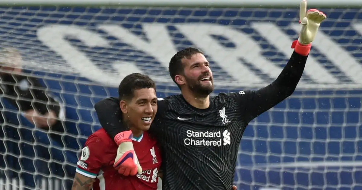 Roberto Firmino and Alisson Becker of Liverpool