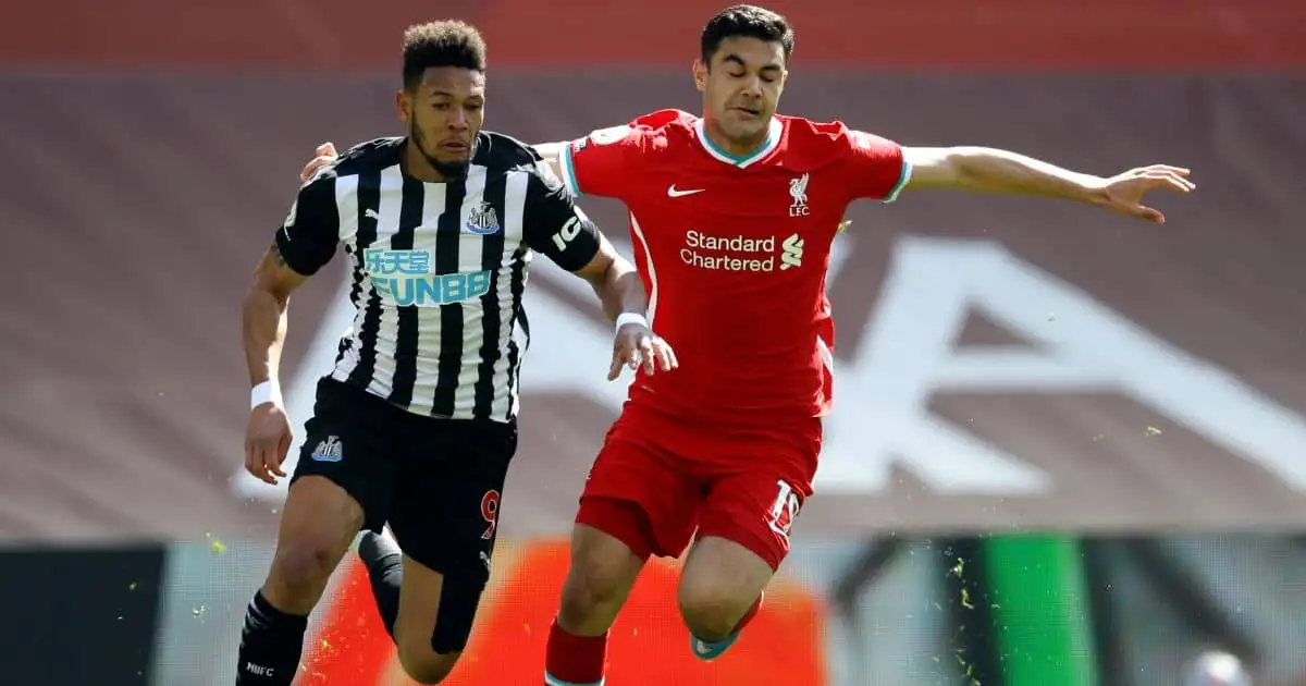 Joelinton tussling with Ozan Kabak, Liverpool v Newcastle