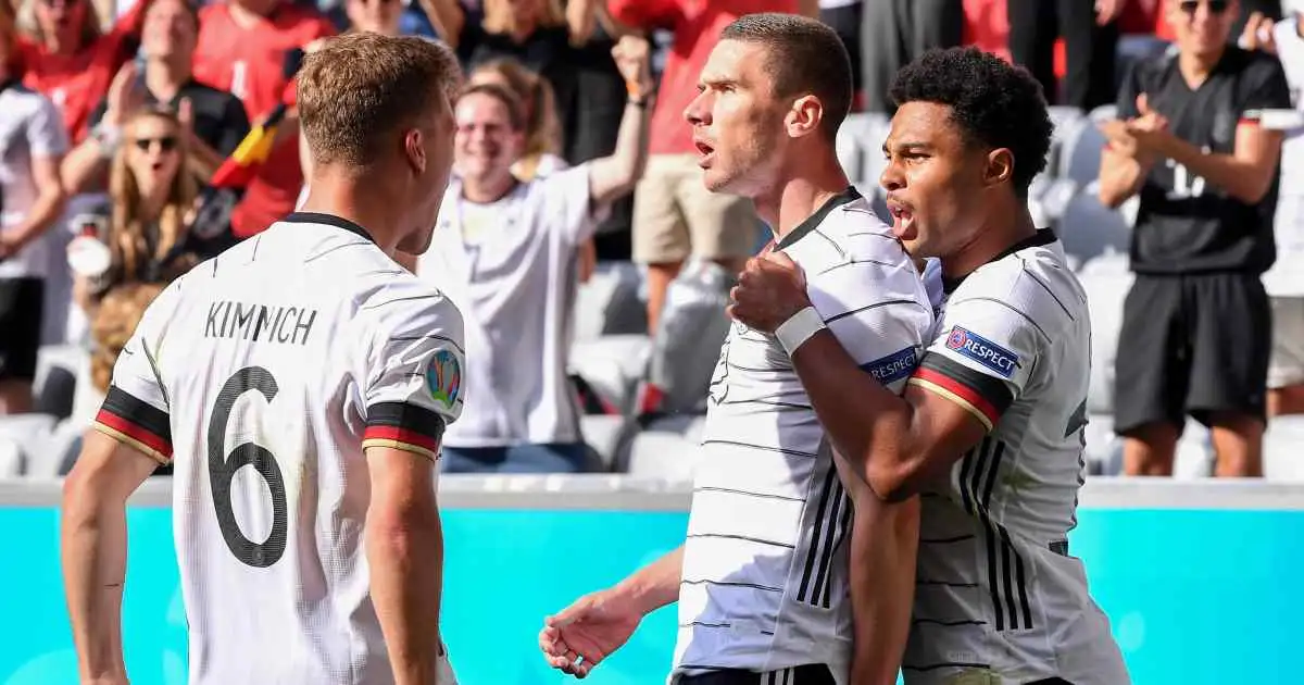 Germany's Mats Hummels, centre, heads on goal during the Euro 2020