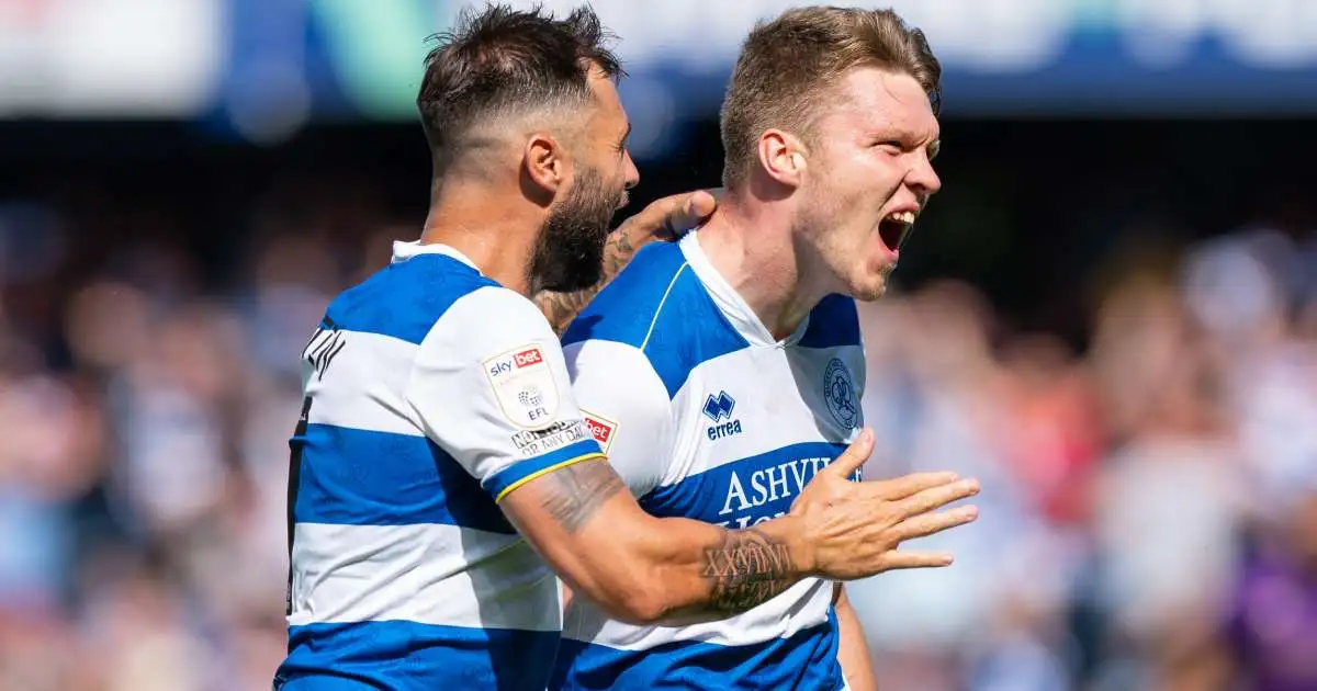 Queen's Park Rangers' Charlie Austin and Rob Dickie celebrating