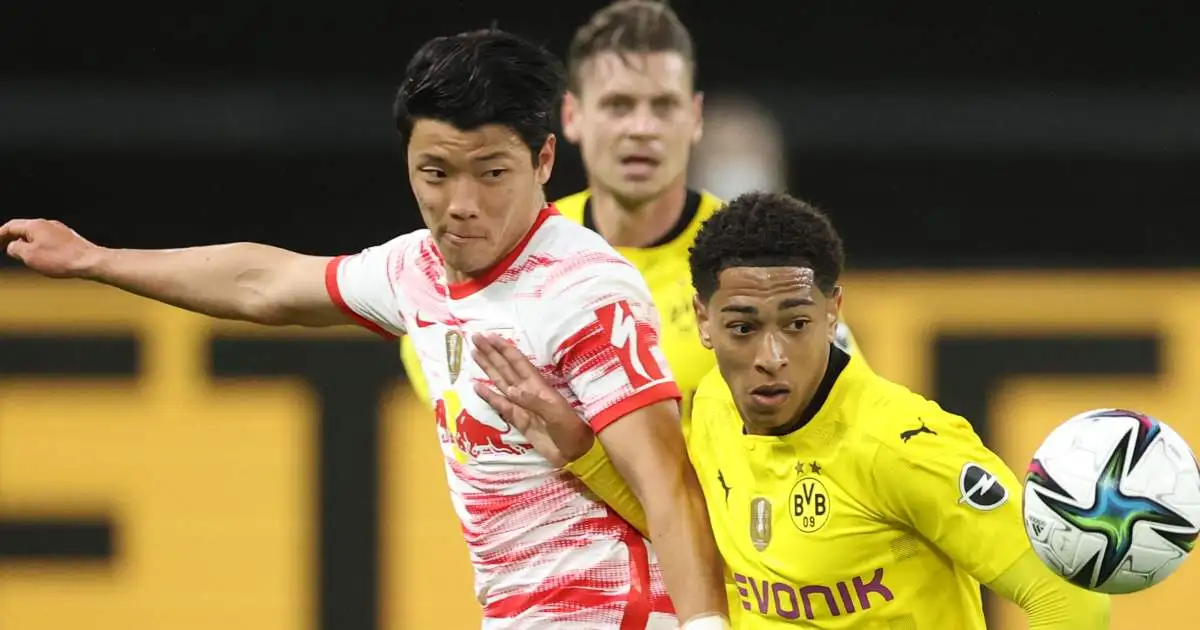 Hwang Hee Chan and Jude Bellingham tussle for possession, May 2021