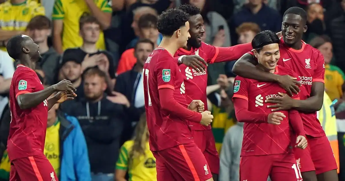Takumi Minamino celebrates scoring for Liverpool at Norwich in the Carabao Cup