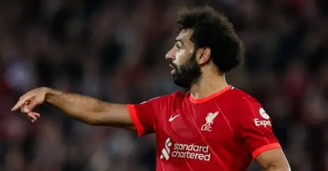 Liverpool winger Mohamed Salah pointing