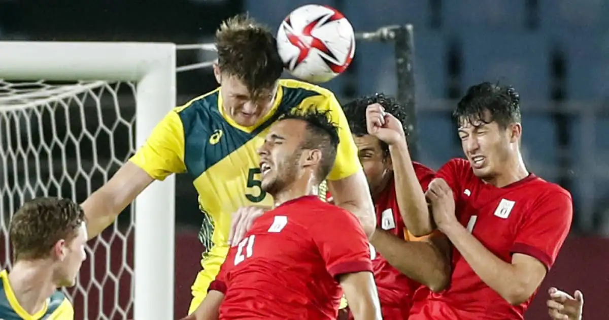 Australia defender Harry Souttar winning a header against Egypt 2021