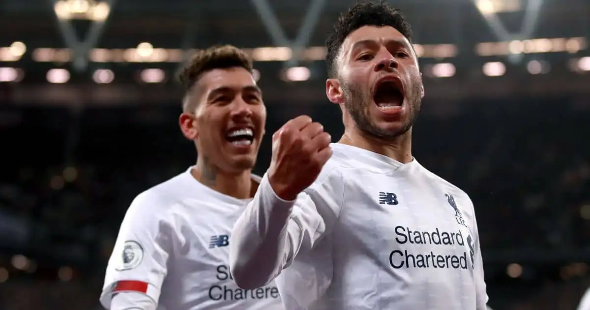 Liverpool's Alex Oxlade-Chamberlain (right) celebrates scoring his side's second goal of the game with team mate Roberto Firmino during the Premier League match against West Ham at London Stadium