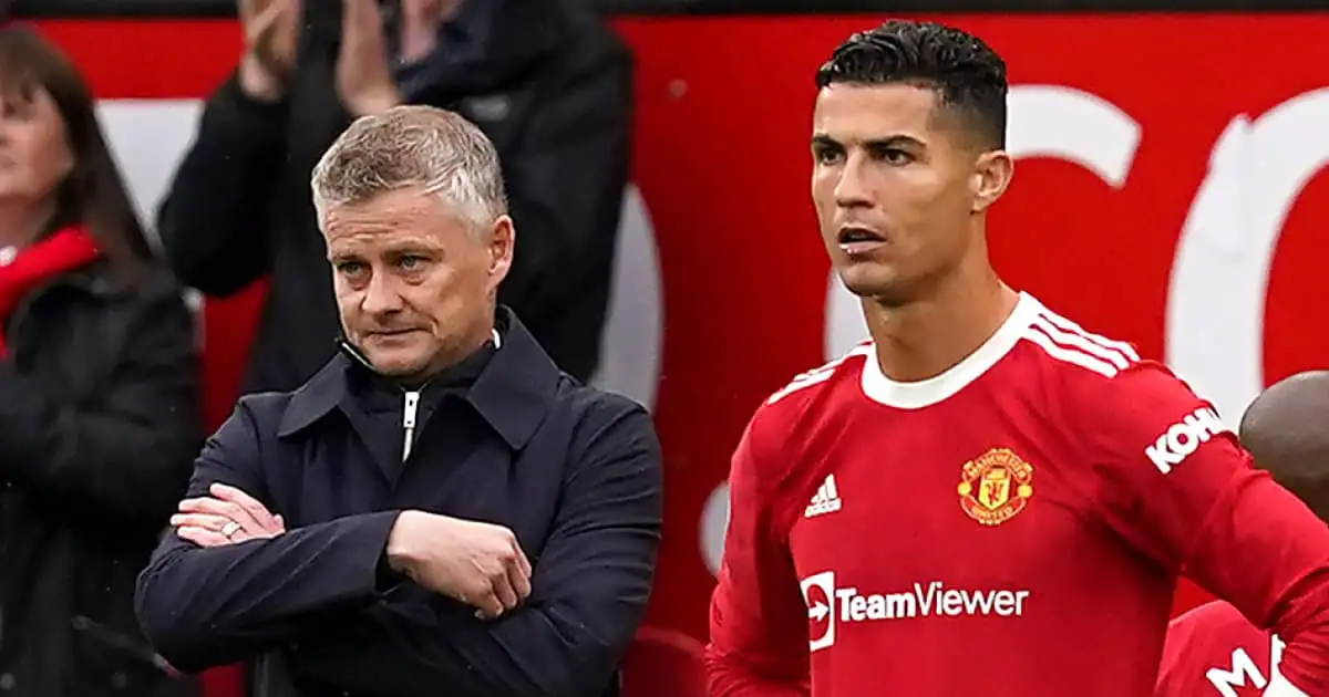 Man Utd manager Ole Gunnar Solskjaer standing alongside Cristiano Ronaldo in 2021