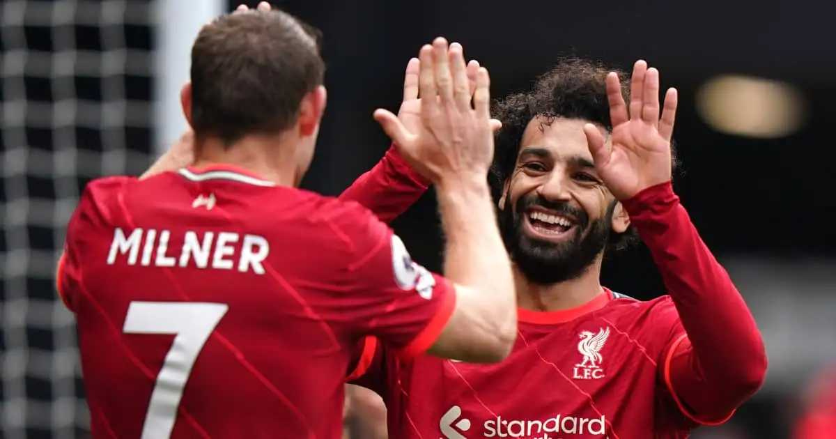 Liverpool pair James Milner and Mohamed Salah celebrating after a goal versus Watford 2021