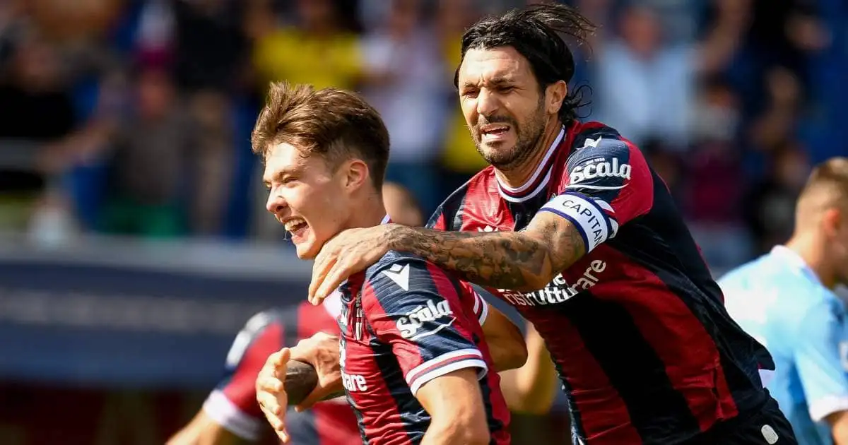 Aaron Hickey and Roberto Soriano celebrating