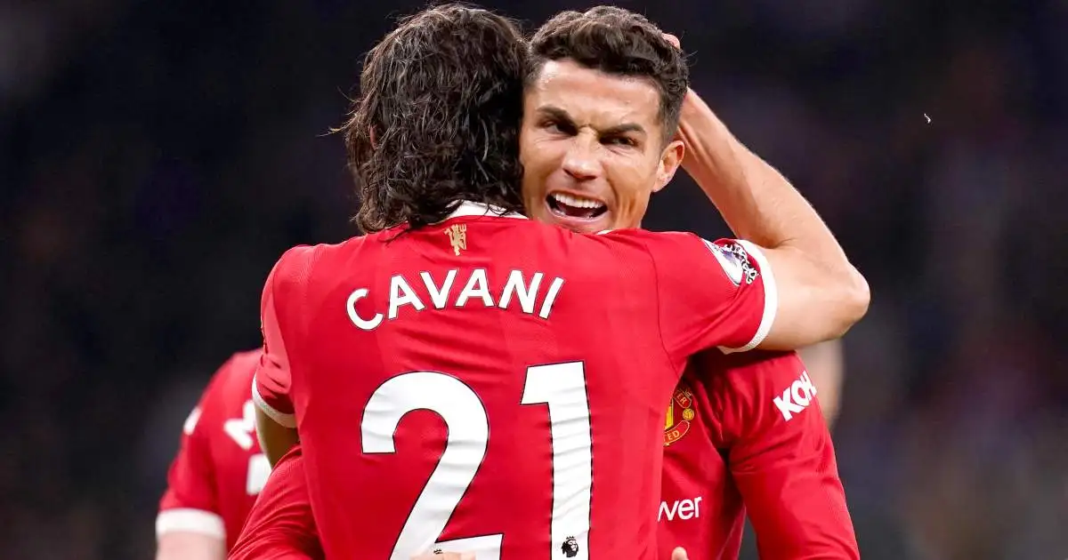 Cristiano Ronaldo and Edinson Cavani hug during Tottenham vs Manchester United, October 2021
