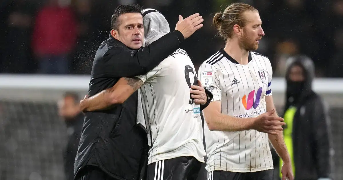 Fulham manager Marco Silva (left), Aleksandar Mitrovic and Tim Ream (right) celebrate after the final whistle during the Sky Bet Championship match at Craven Cottage.