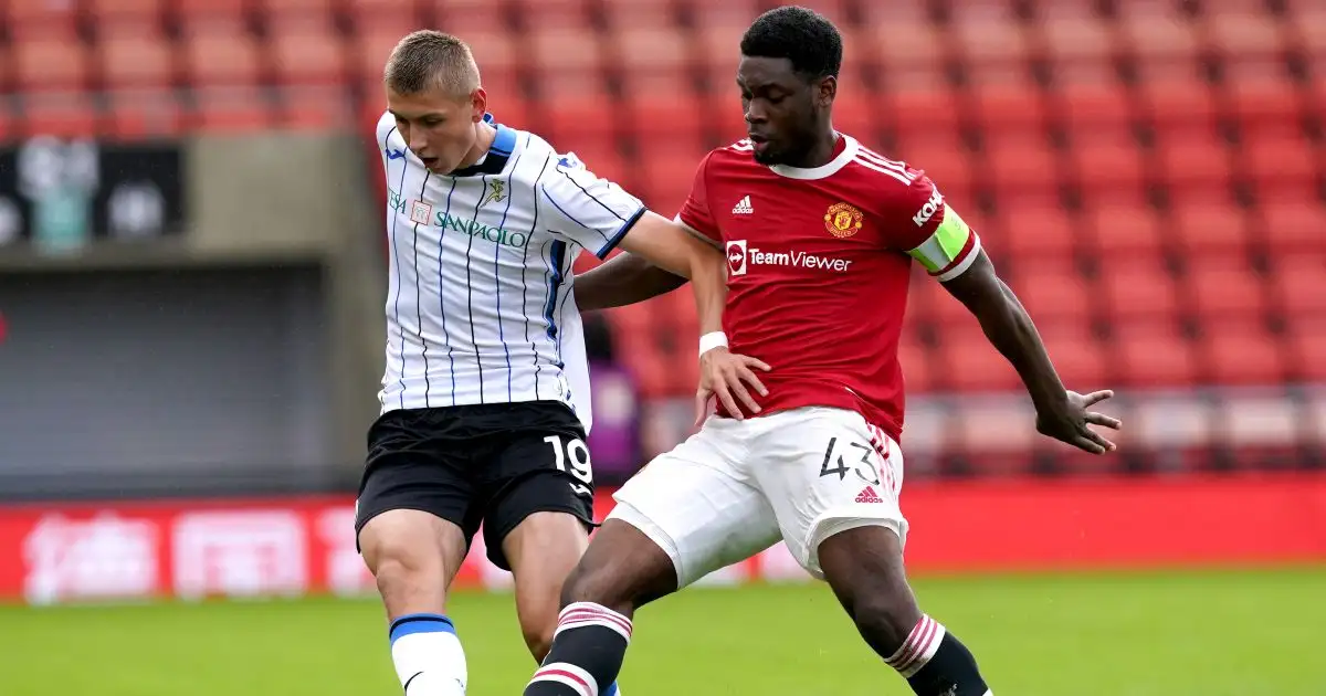 Manchester United's Teden Mengi battles for the ball during the UEFA Youth League