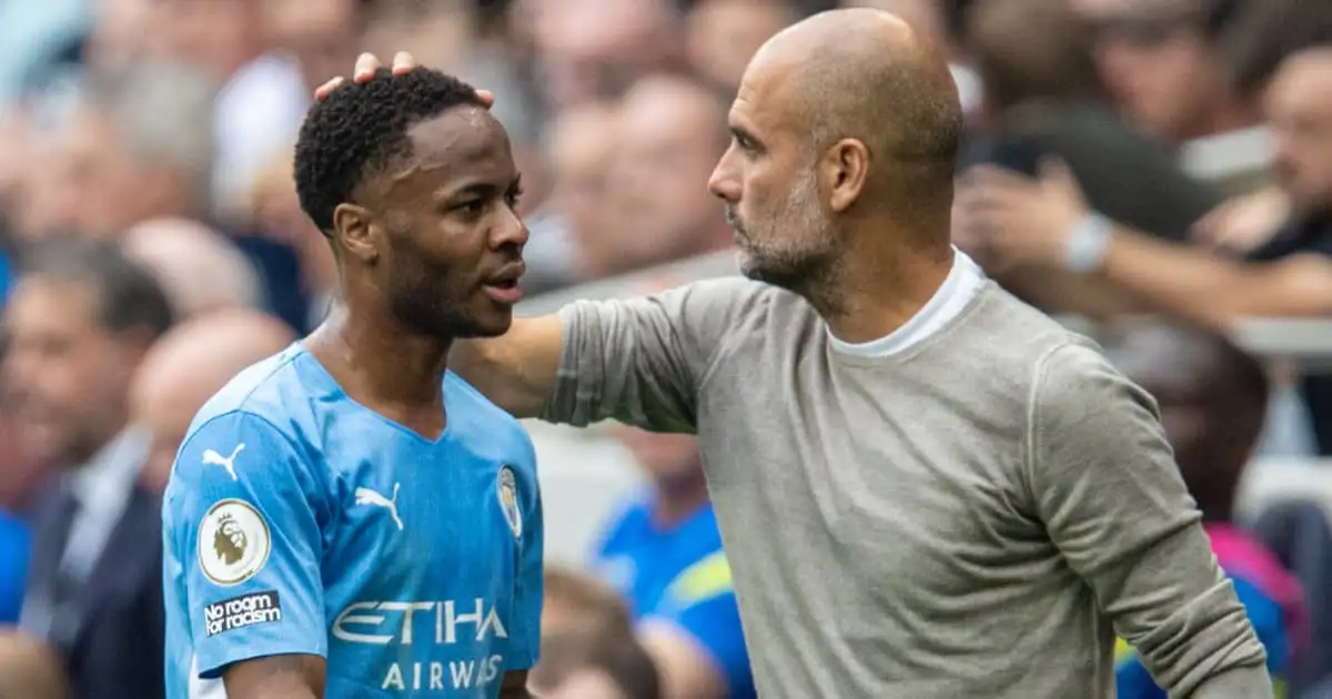 Man City forward Raheem Sterling being consoled by Pep Guardiola 2021