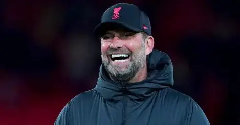 Jurgen Klopp smiling before a Liverpool game