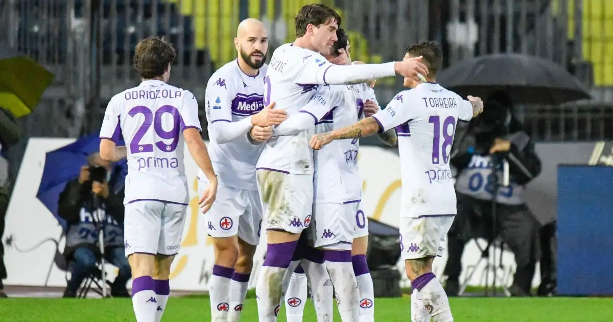 Dusan Vlahovic celebrates with teammates after scoring.