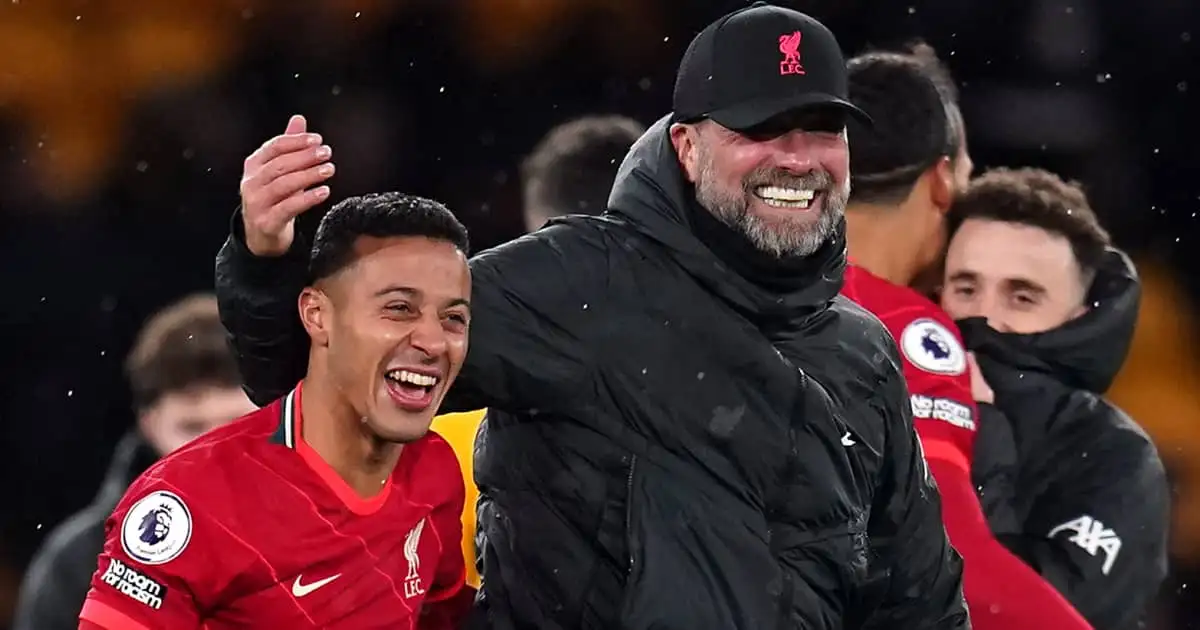 Liverpool manager Jurgen Klopp grinning alongside Thiago Alcantara