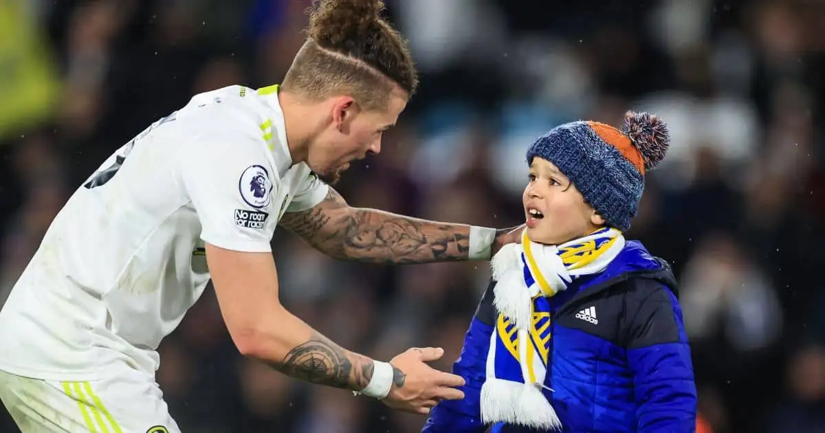 Kalvin Phillips, Leeds midfielder with a young supporter after Premier League win over Crystal Palace