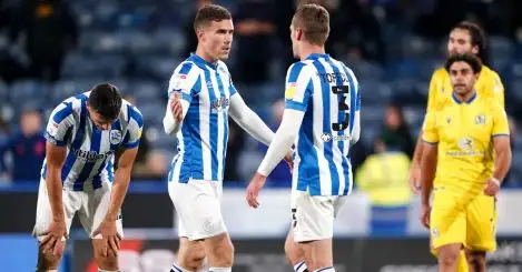 Huddersfield Town's Josh Ruffels and Harry Toffolo celebrate after the final whistle
