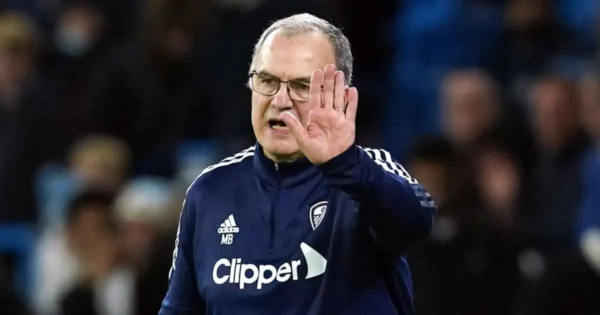 Marcelo Bielsa raising his hand during a Leeds game