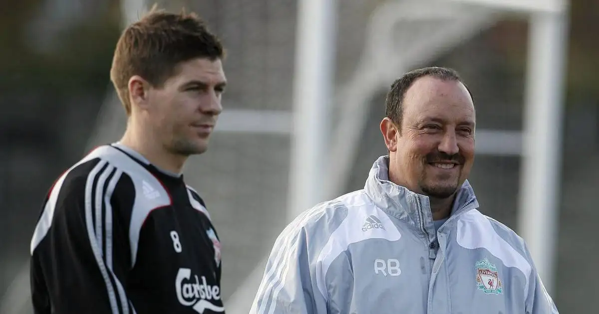 Steven Gerrard and Rafael Benitez stand during a Liverpool training session, 2008