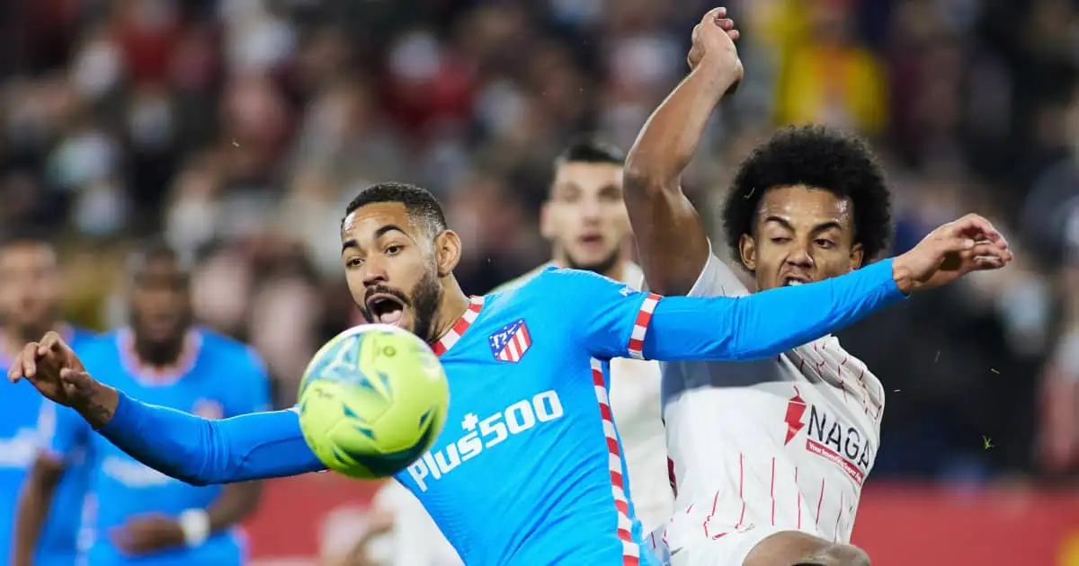 Atletico Madrid attacker Matheus Cunha battling Sevilla centre-half Jules Kounde