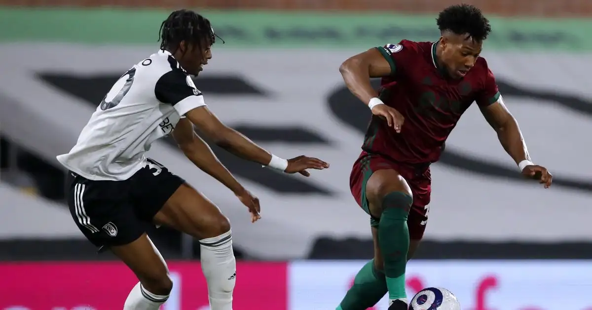 Wolverhampton Wanderers' Adama Traore (right) and Fulham's Terence Kongolo battle for the ball during the Premier League match at Craven Cottage