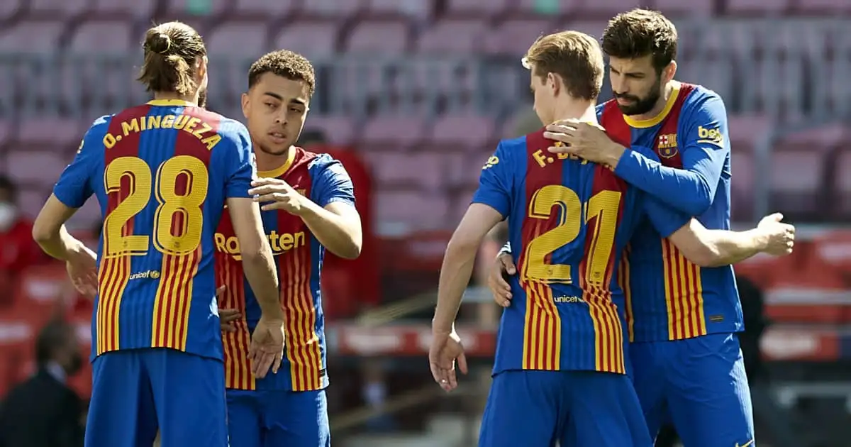 Barcelona players Oscar Mingueza, Sergino Dest, Gerard Pique and Frenkie de Jong