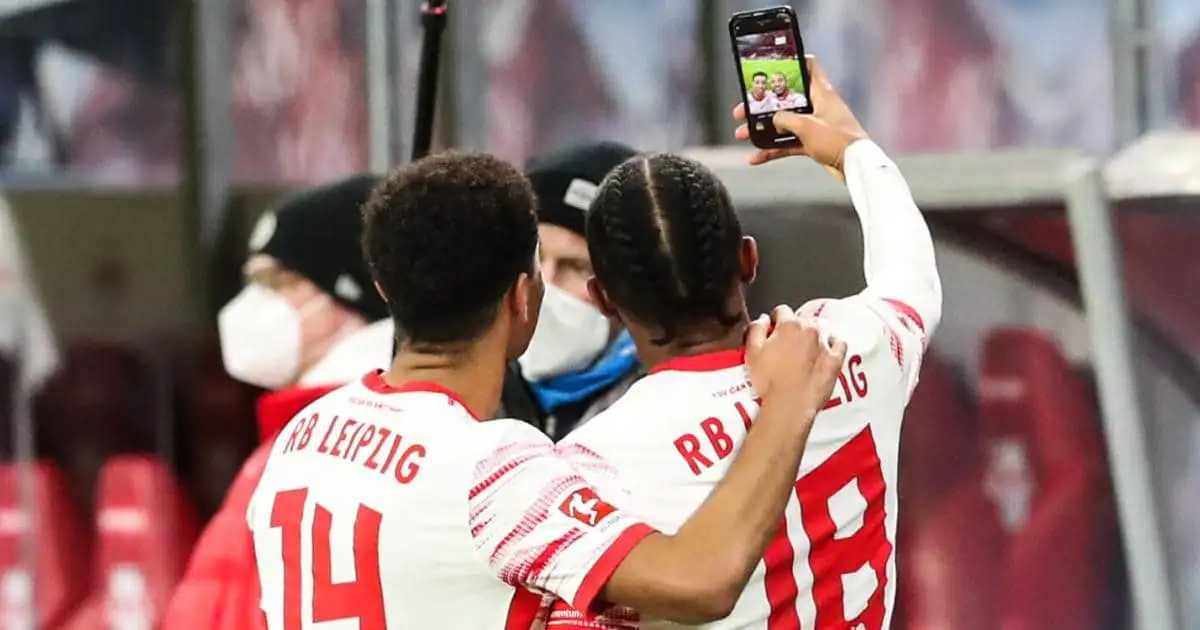 Tyler Adams and Christopher Nkunku celebrate for RB Leipzig