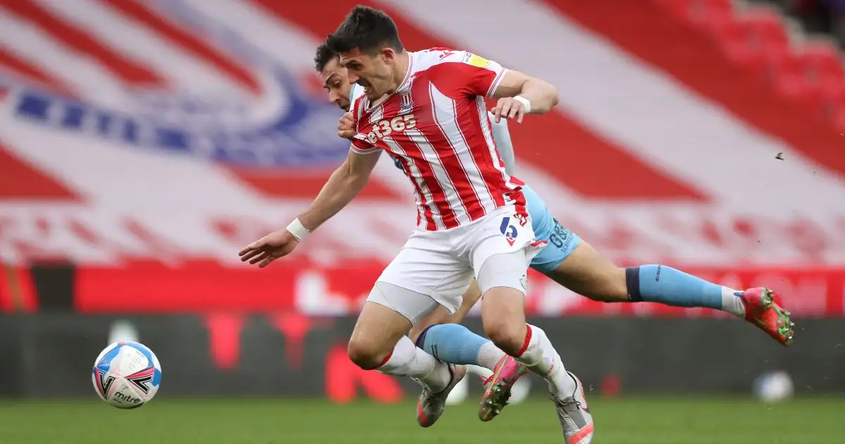 Stoke City's Danny Batth battle for the ball during the Sky Bet Championship match at the bet365 Stadium