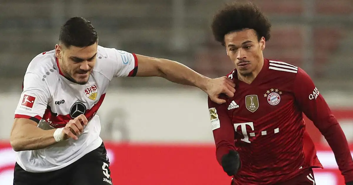 Konstantinos Mavropanos and Leroy Sane battle for possession during Stuttgart vs Bayern Munich, December 2021