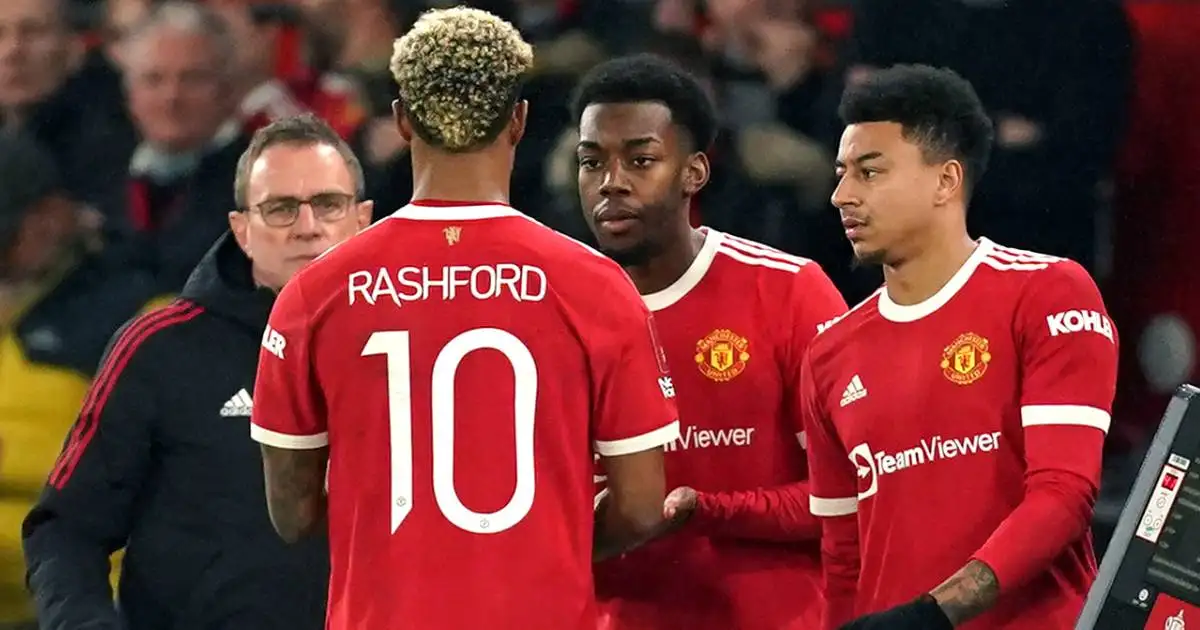 Ralf Rangnick, Marcus Rashford, Anthony Elanga and Jesse Lingard during a Manchester United substitution