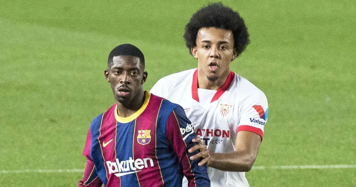 Ousmane Dembele and Jules Kounde contest possession during Barcelona vs Sevilla, March 2021