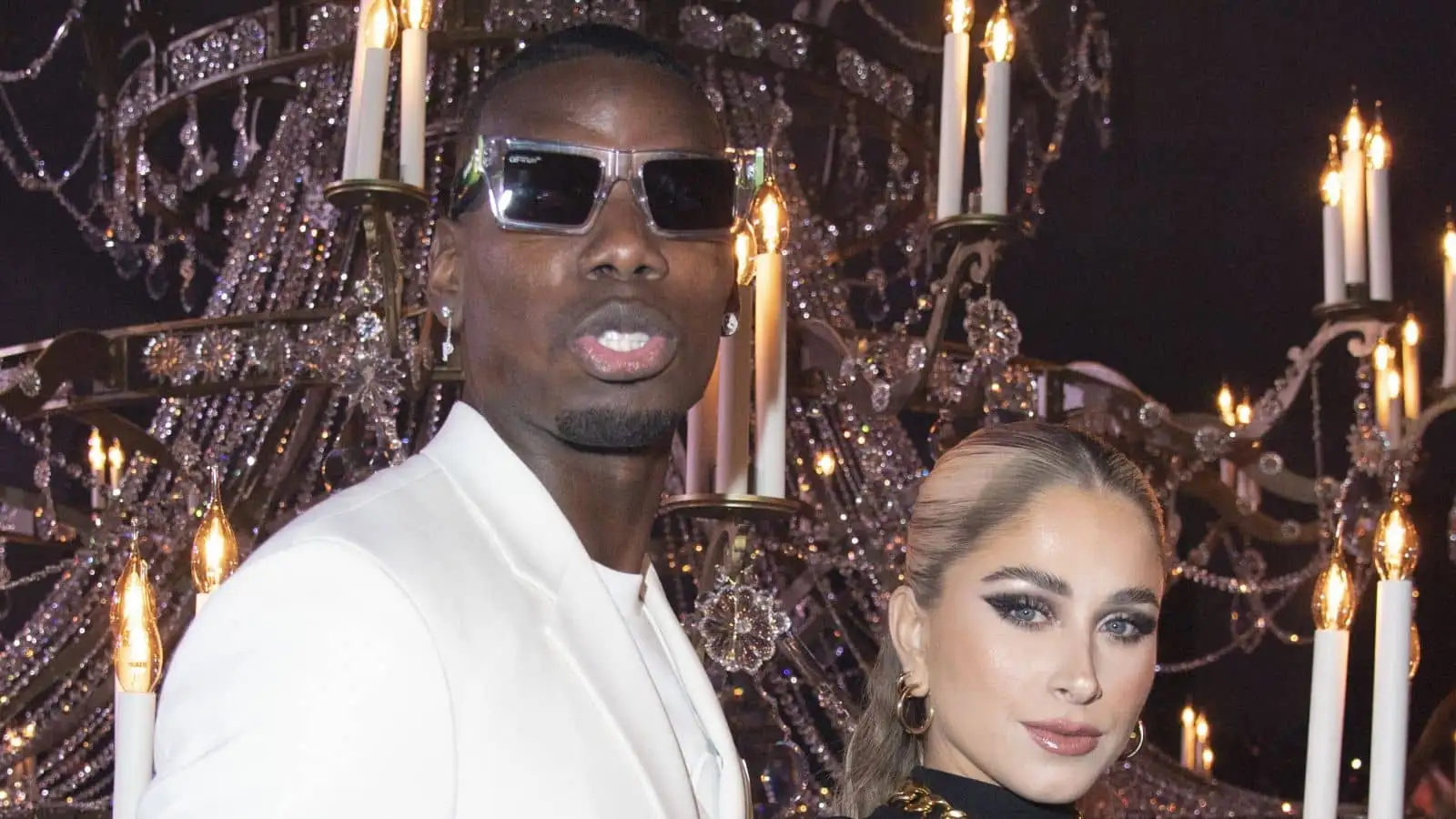 Manchester United star Paul Pogba with his wife .Zulay Pogba attending the Off-White Womenswear Fall/Winter 2022-2023 show Spaceship Earth: An "Imaginary Experience" at Palais Brongniart during Paris Fashion Week in Paris, France on February 28, 2022