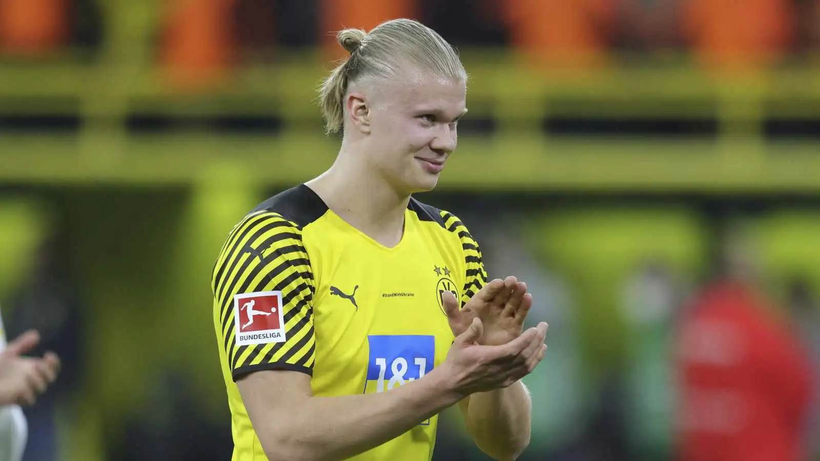 Borussia Dortmund striker Erling Haaland claps