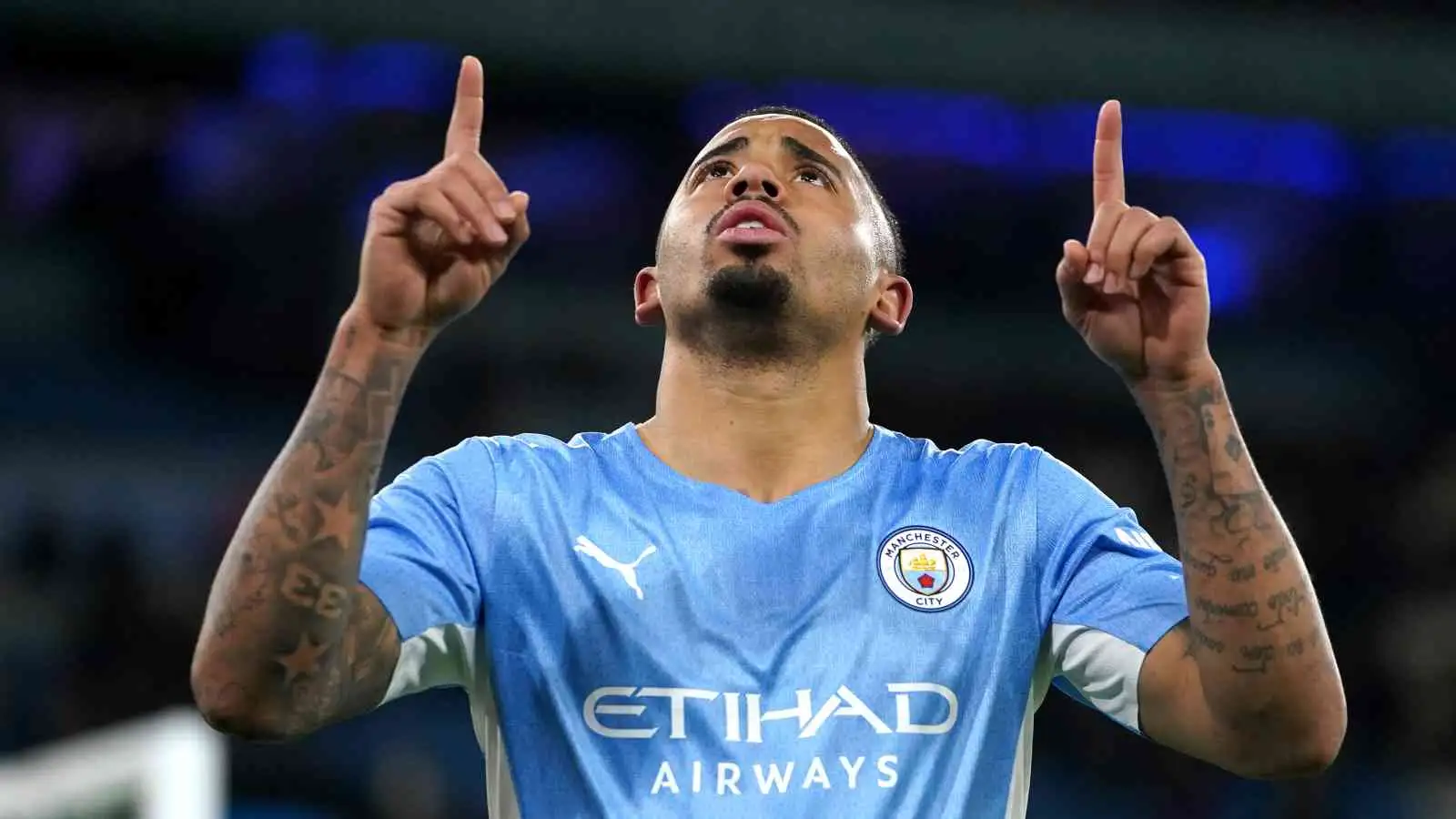 Gabriel Jesus pointing to the sky in celebration for Man City