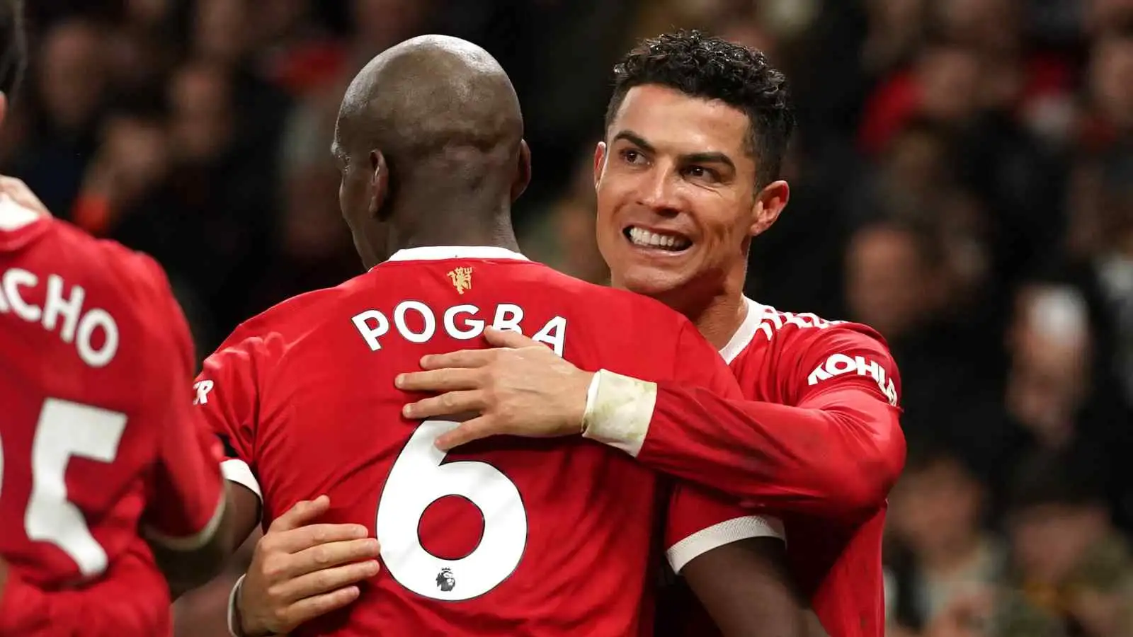 Paul Pogba and Cristiano Ronaldo embrace