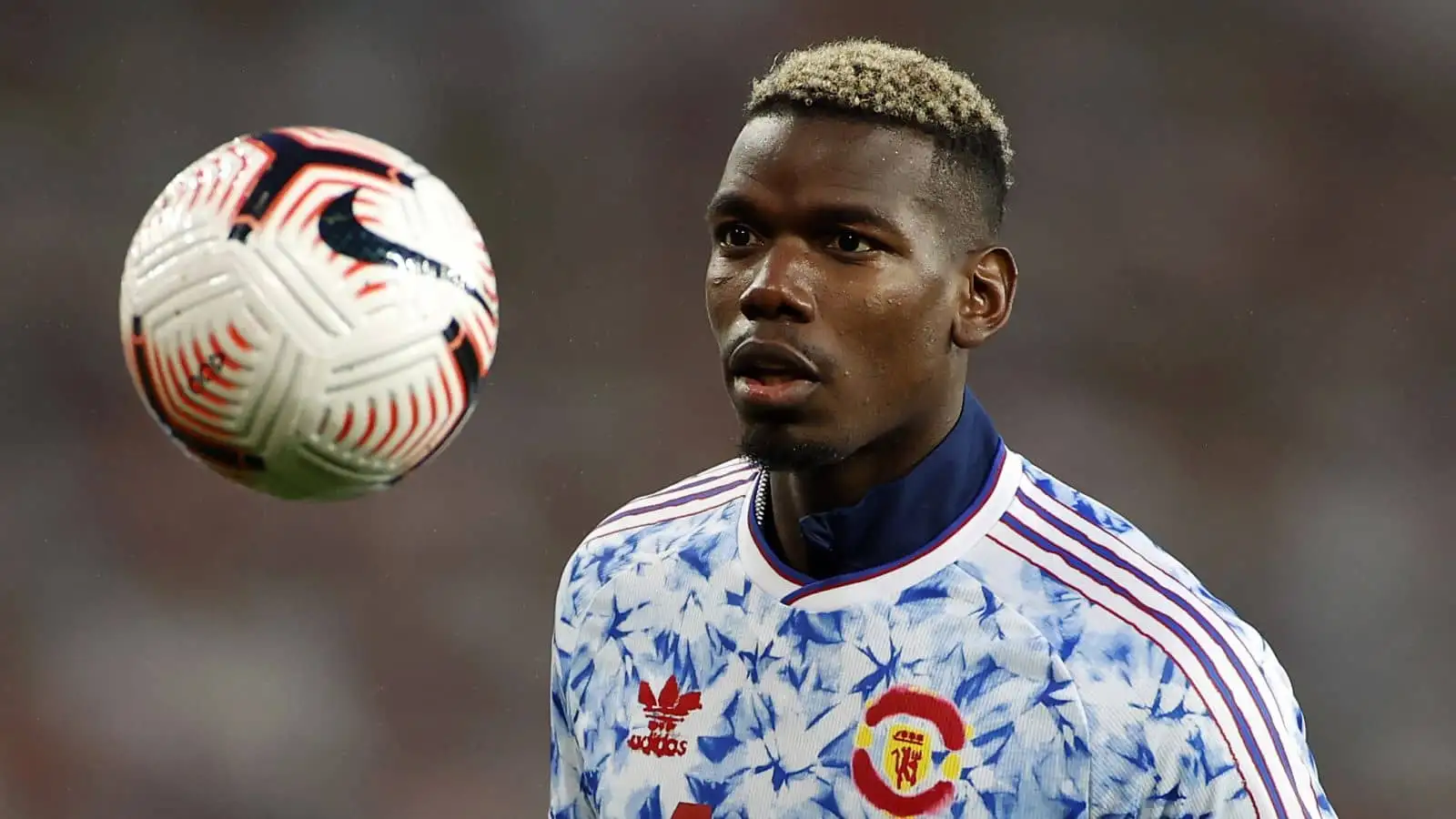 Paul Pogba warms up for Man Utd prior to Premier League game at Arsenal