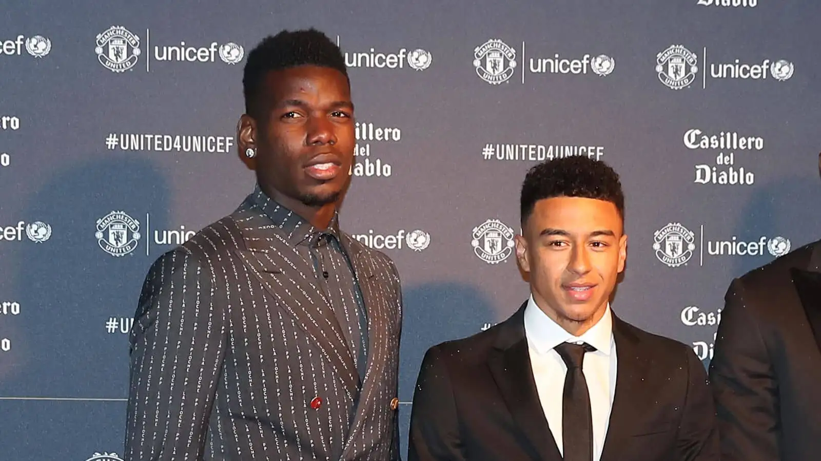 Paul Pogba (left), Jessie Lingard during the red carpet arrivals for the Manchester United United for Unicef Gala Dinner at Old Trafford, Manchester