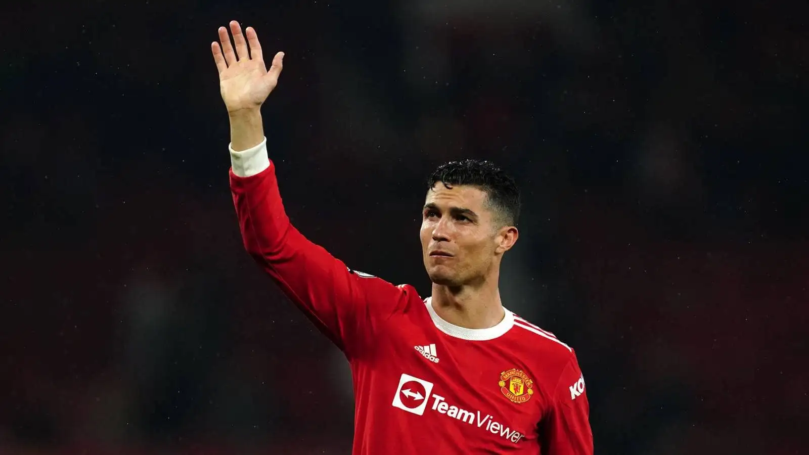 Cristiano Ronaldo waving to the Old Trafford crowd after a Manchester United win