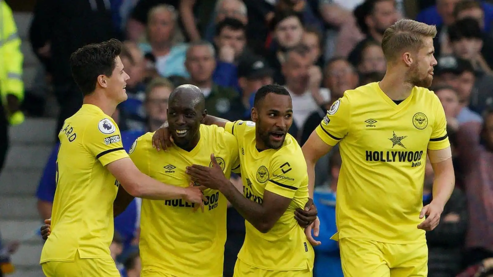 Yoane Wissa celebrating with Brentford teammates after scoring against Everton