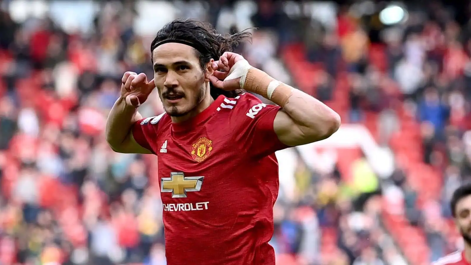 Manchester United's Edinson Cavani celebrates scoring their side's first goal of the game during the Premier League match at Old Trafford, Manchester