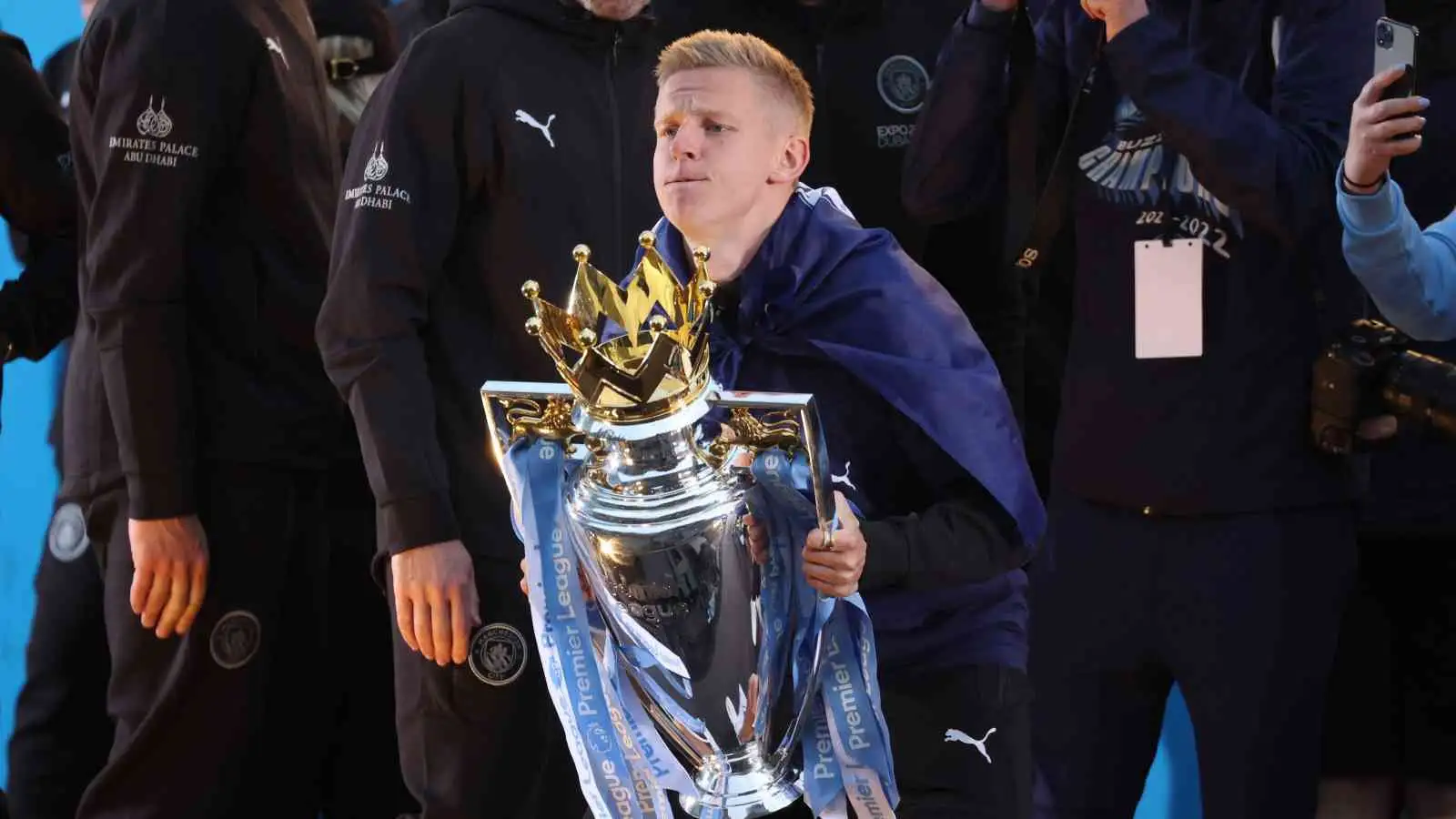 Oleksandr Zinchenko holding the Premier League trophy