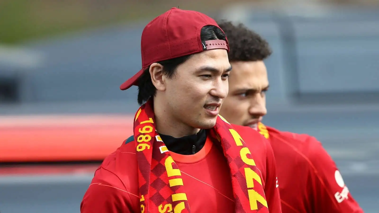 Takumi Minamino of Liverpool looks on. Liverpool Football Club victory parade in Liverpool on Sunday 29th May 2022