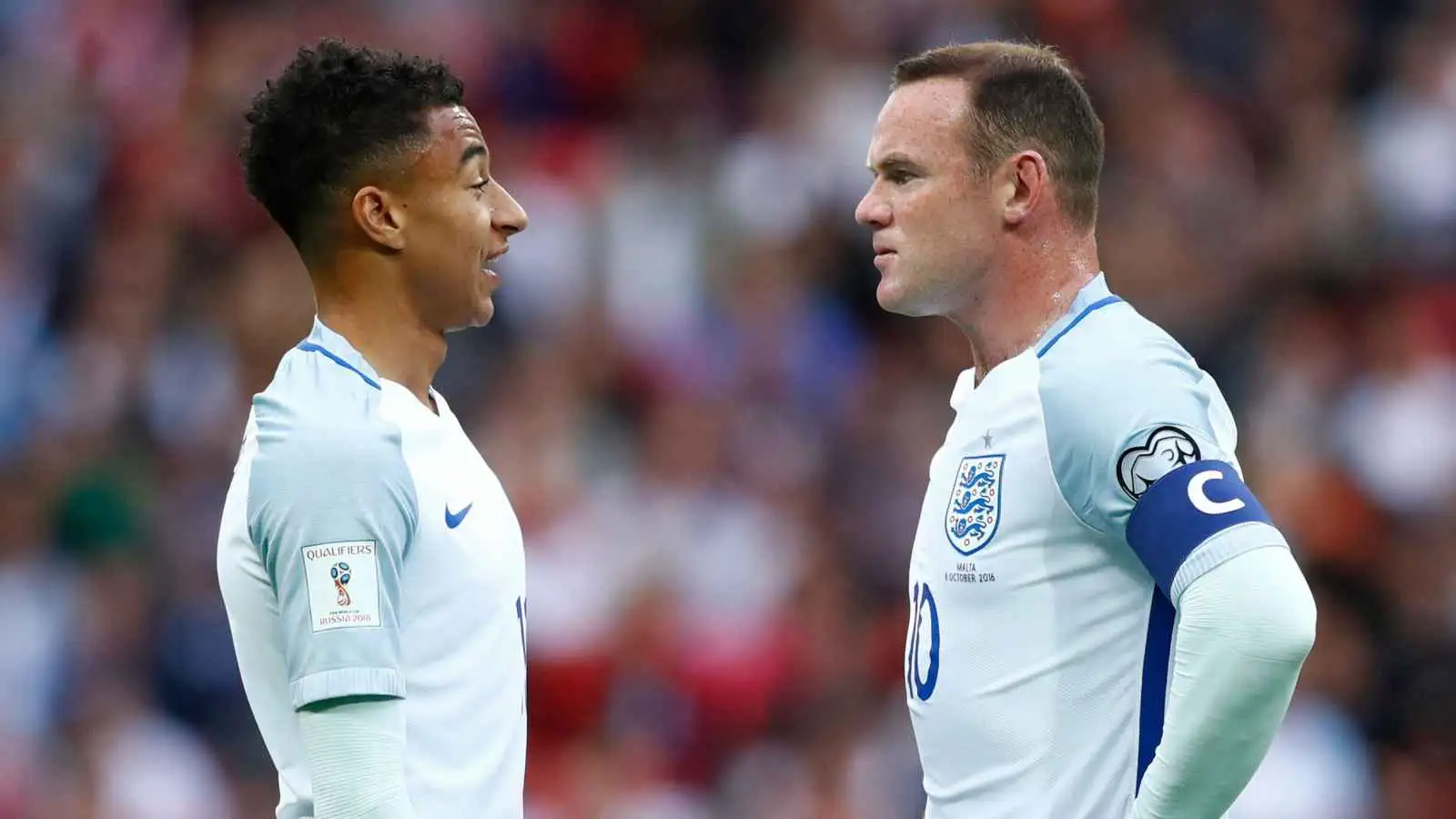 Jesse Lingard and Wayne Rooney representing England