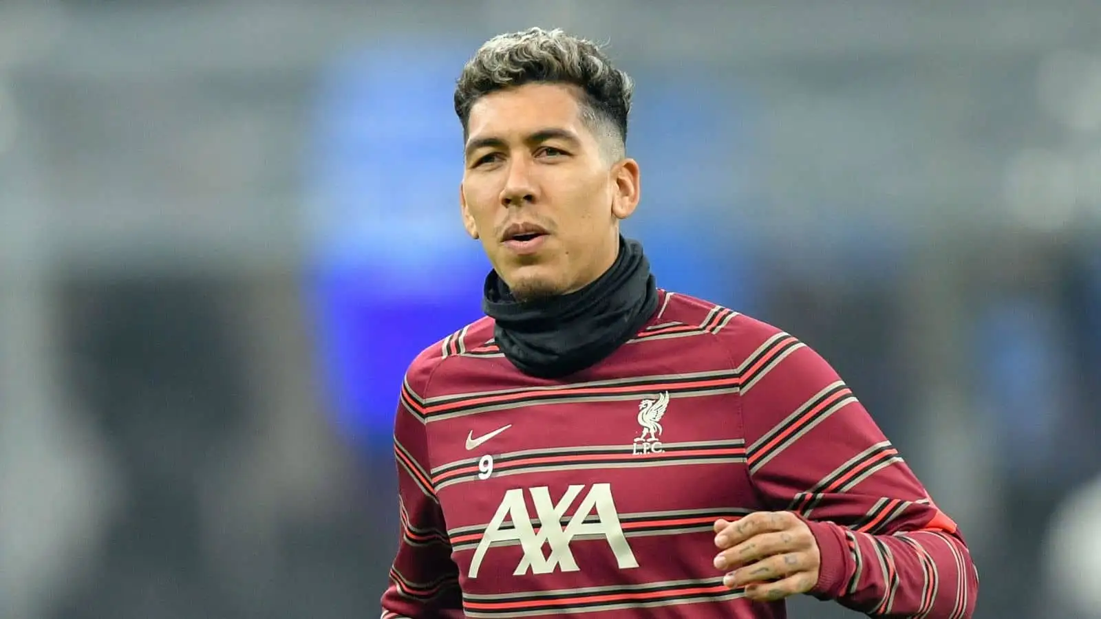 Roberto Firmino (9) of Liverpool is warming up before the UEFA Champions League match between Inter and Liverpool at Giuseppe Meazza in Milano