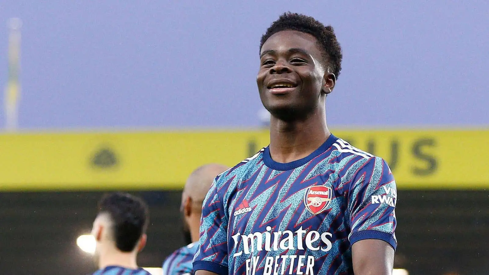 Bukayo Saka of Arsenal celebrates getting the first goal of the game during the Premier League match between Norwich City and Arsenal at Carrow Road