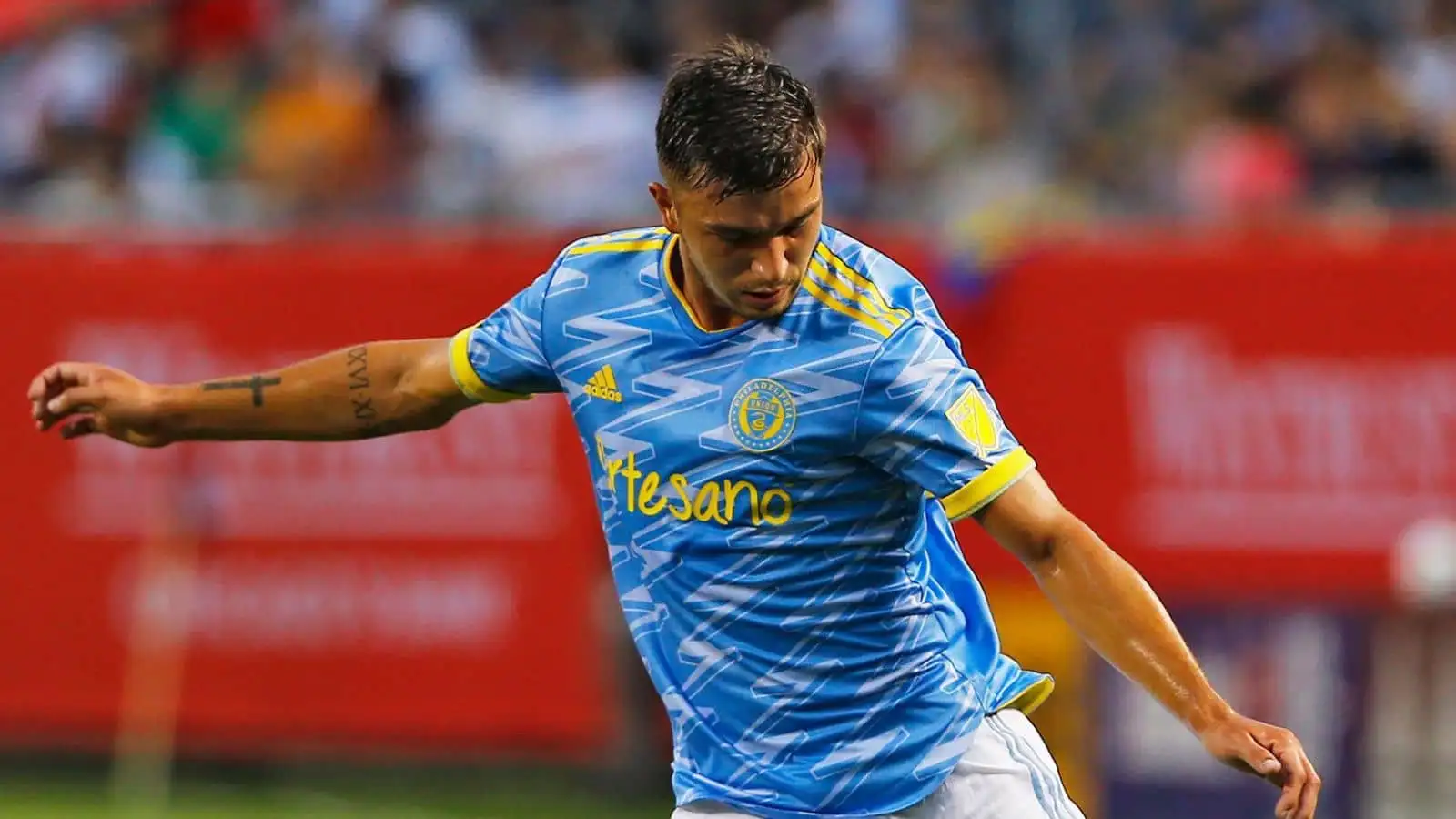 Kai Wagner (27) of Philiadelphia Union takes a shot on goal during a match against the Chicago Fire FC at Soldier Field in Chicago, IL, USA