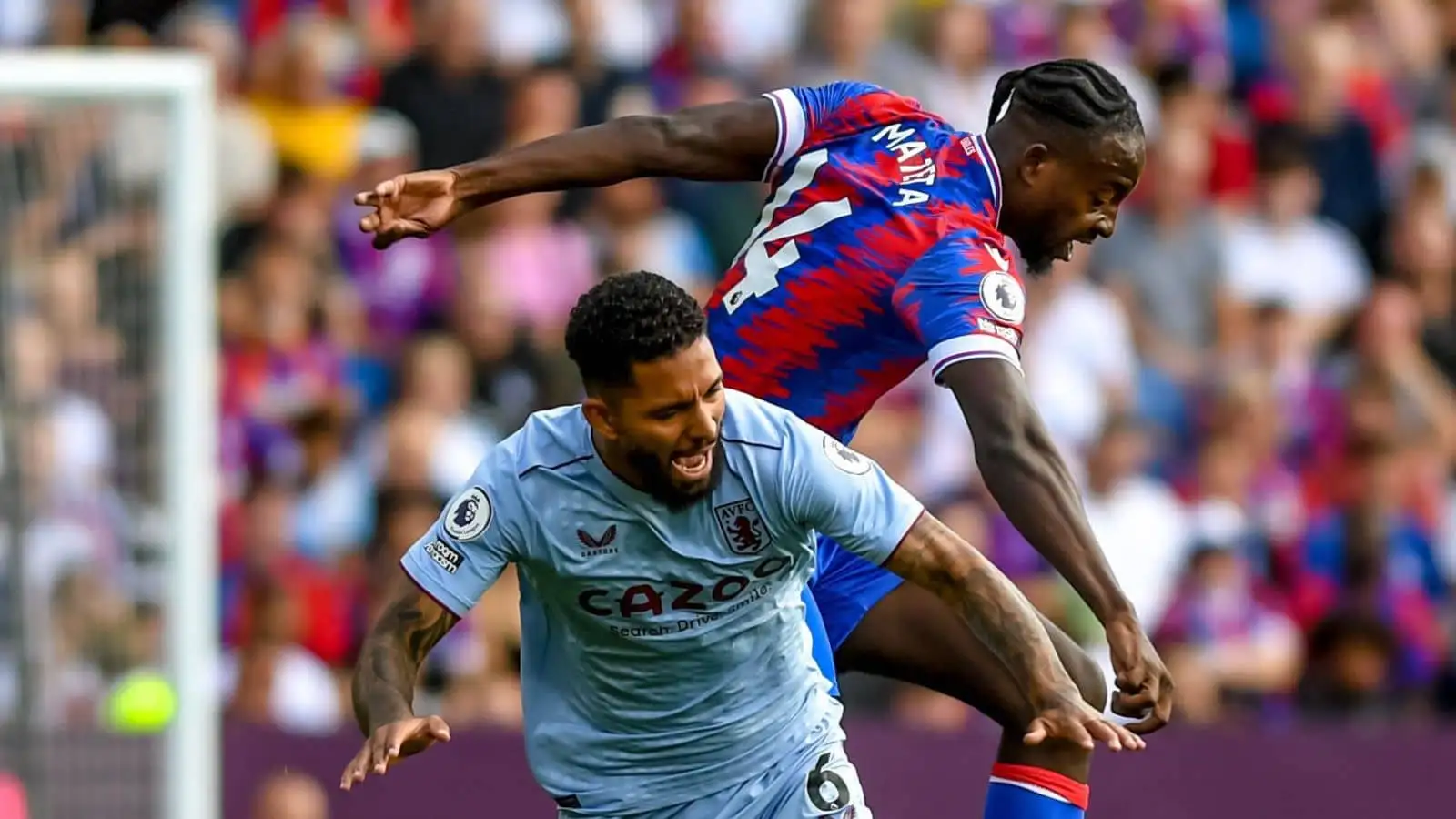 Douglas Luiz under pressure from Jean-Philippe Mateta of Crystal Palace FC takes the ball past Douglas Luiz of Aston Villa FC during the Premier League match between Crystal Palace and Aston Villa at Selhurst Park, London