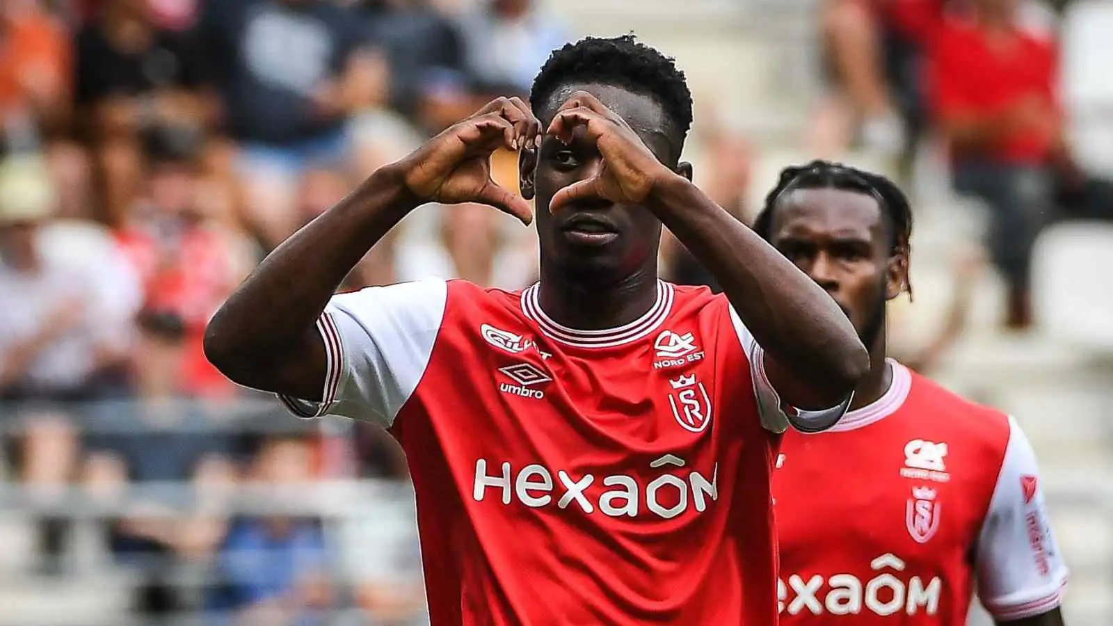 Folarin Balogun celebrating a goal for Reims while on loan from Arsenal Folarin Balogun celebrating for Reims